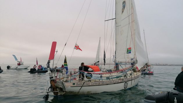 No wind, meant it took hours for Kirsten Neuschafer to sail the Minnehaha over the finish line. Credit: Katy Stickland