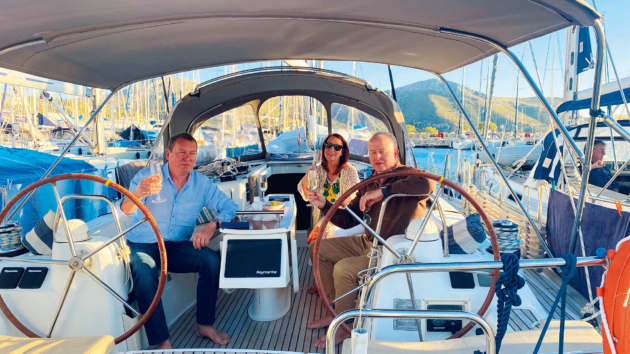 Denis Lyons and his joint owners celebrate the start of the season in Greece.
